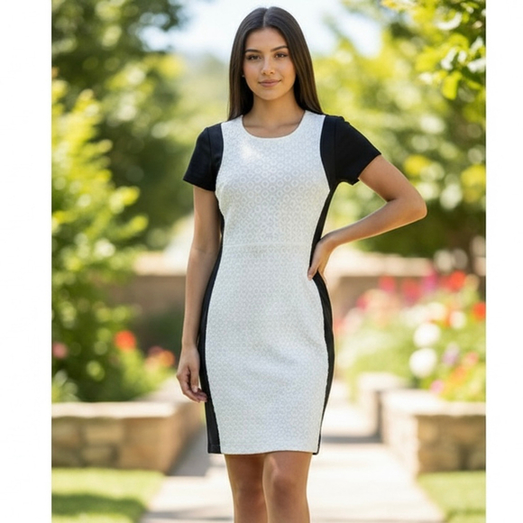 Diane von Furstenberg Dresses & Skirts - DIANE von FURSTENBERG DVF Fitted Dress White Eyelet Front Black Knit Back Sz 4